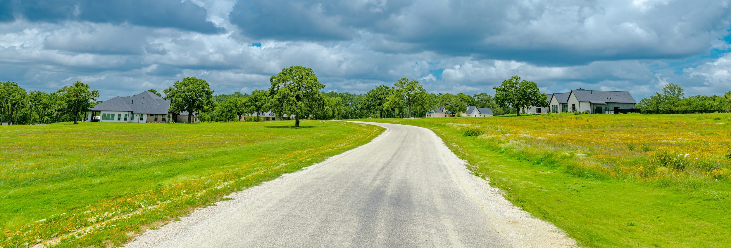 Curving road through a green countryside